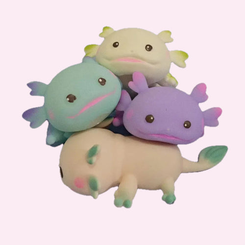 Axolotl squishy in four colours - mint green, purple, cream and pale pink - grouped together on a pink background - Trendy Toyz AU