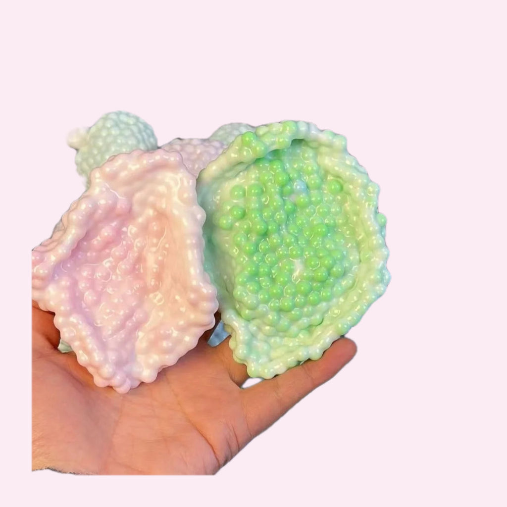Berry Bobble squishy stress balls held in a hand on a pink background - Trendy Toyz AU
