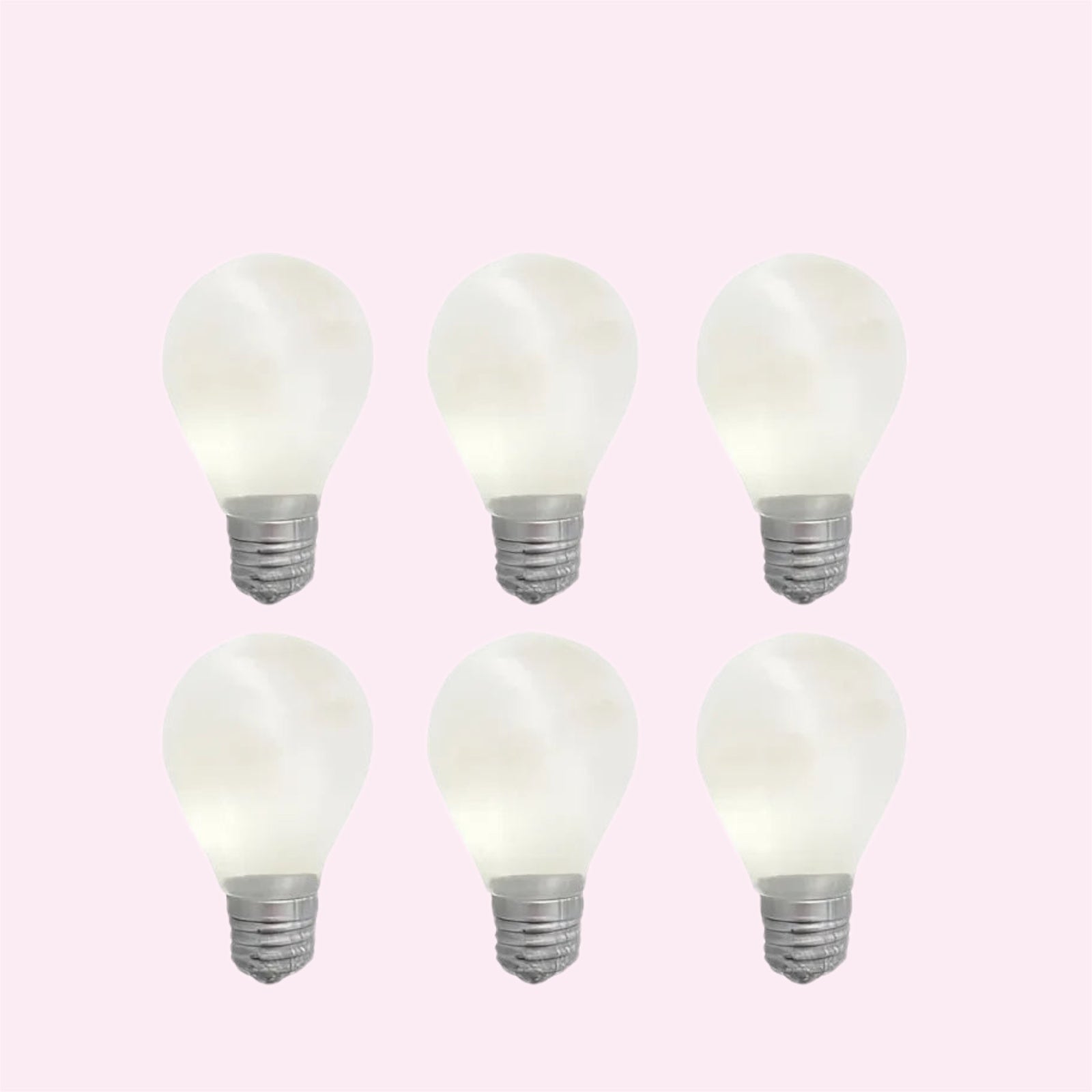 Six glow in the dark lightbulb squishies arranged on a pink background - Trendy Toyz AU