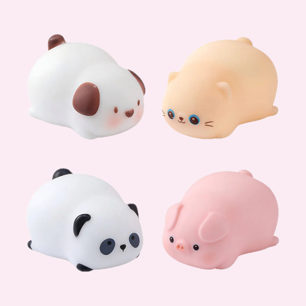 Four mochi pet squishies - panda, kitten, puppy and piggy - on a pink background - Trendy Toyz AU
