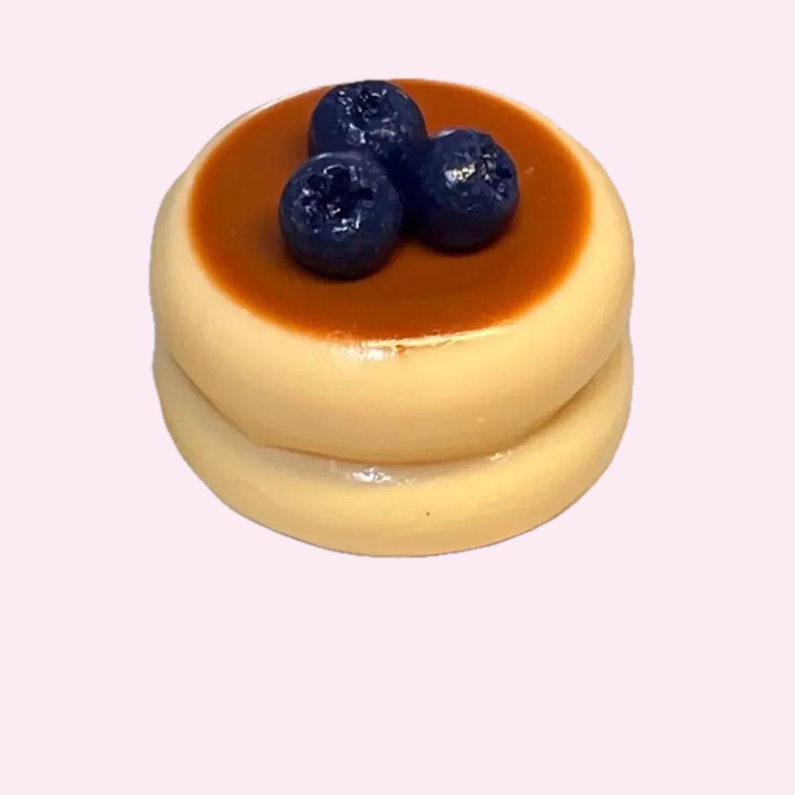 Souffle pancake squishy with syrup and blueberries on top, on a pink background - Trendy Toyz AU
